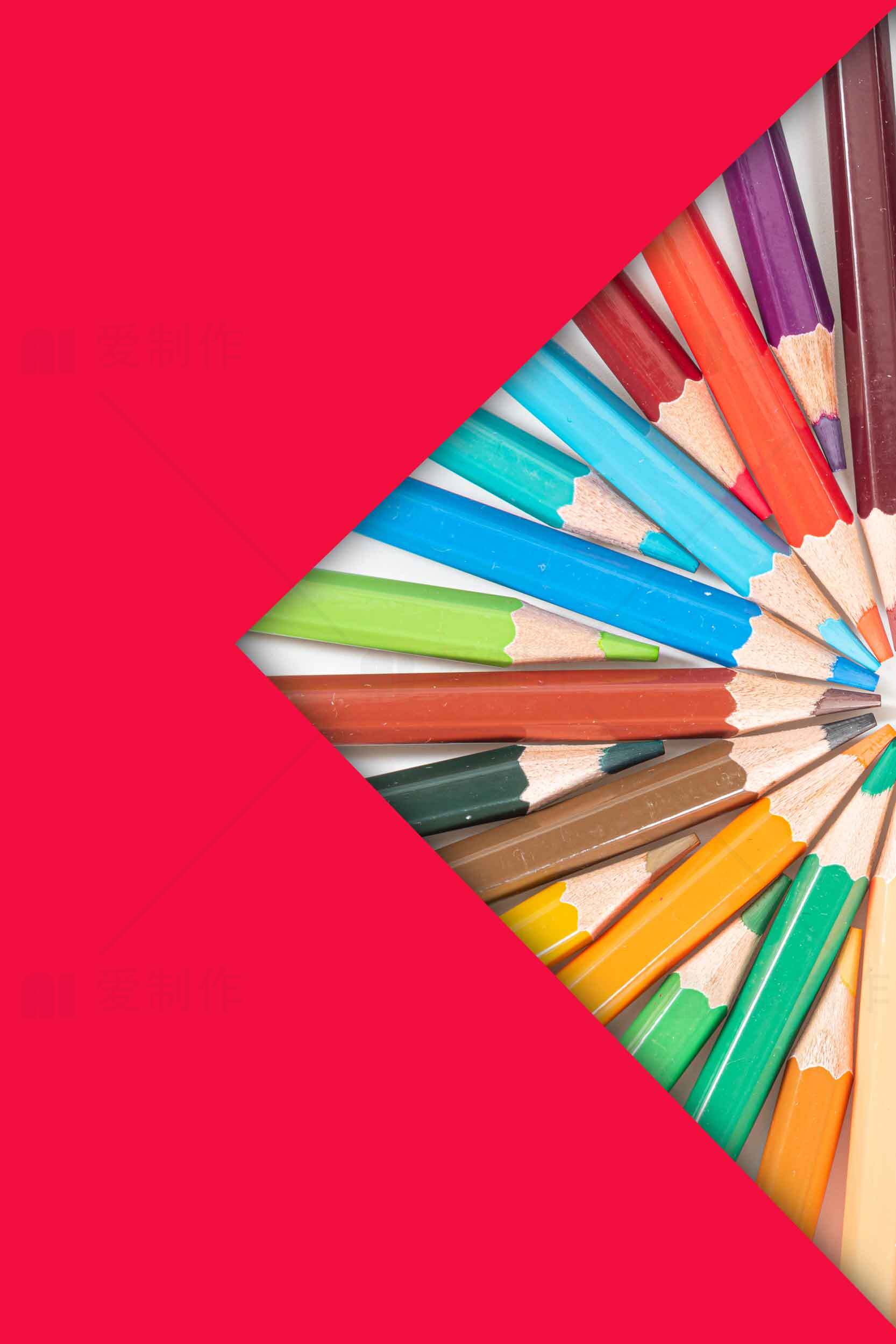 彩色铅笔创意排列与红色背景设计素材